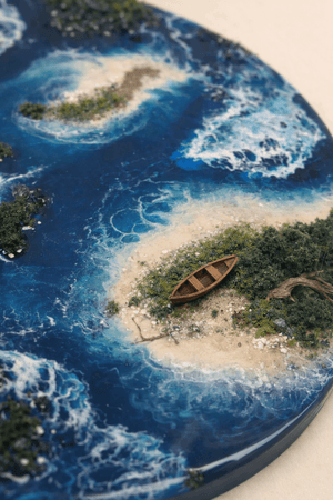 Coastal scene with blue water, sandy islands, and a small boat made using Apex Resin